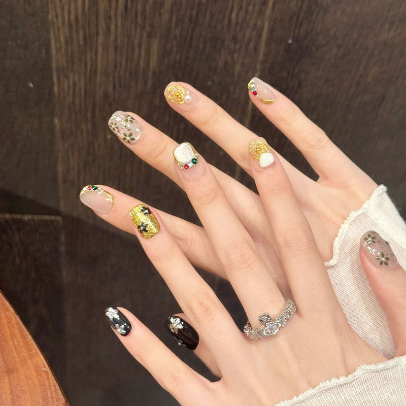 Premium oval press-on nails for luxury elegance - silver floral details, gold patterns, multicolor gemstones, perfect for special occasions