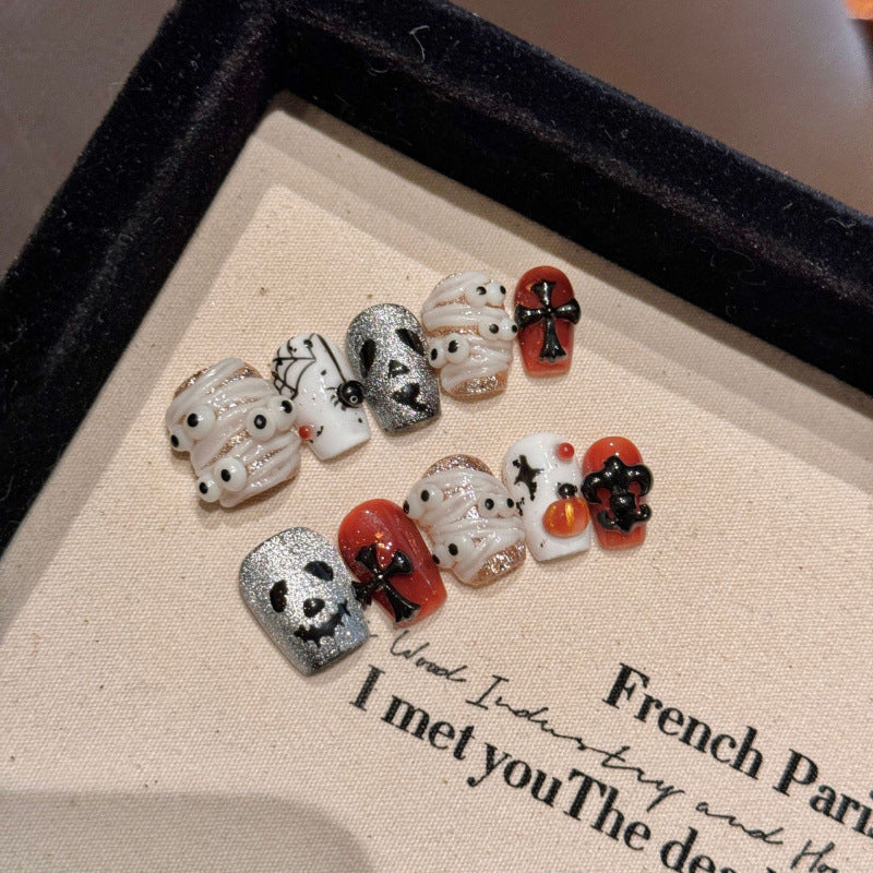 Premium quality Halloween coffin short nails with silver skulls, crosses, and pumpkin motifs for gothic style