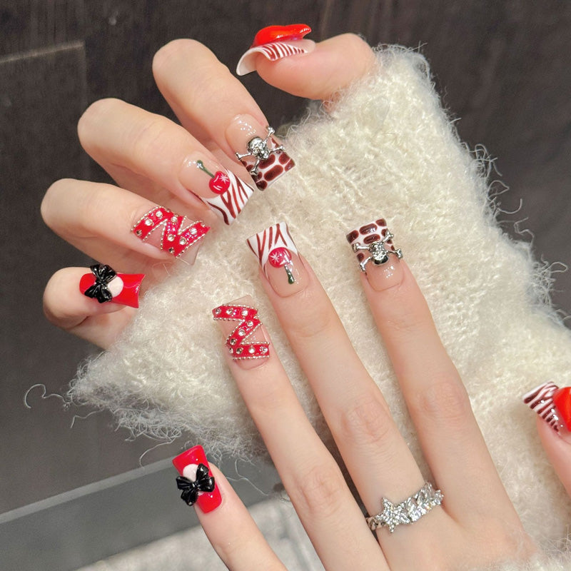 Premium red duck nails with 3D lips, skull charms, cherry details & rhinestones - Damage-free, reusable luxury - Pin-up bold beauty