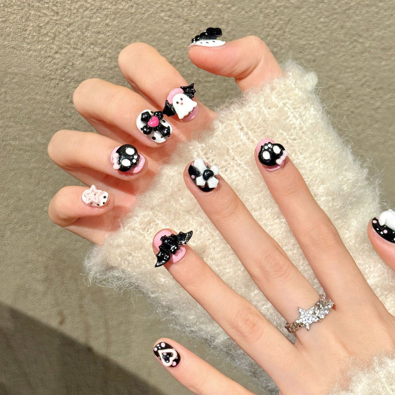 Premium squoval short nails for kawaii charm - adorable 3D ghost, skull with bow, black bat, pink heart, polka dots, perfect for Halloween celebrations