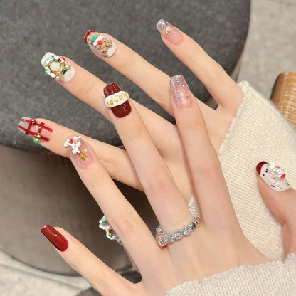 Premium squoval short press-on nails for Christmas fun - adorable 3D characters, candy cane stripes, sparkling glitter, perfect for festive gatherings