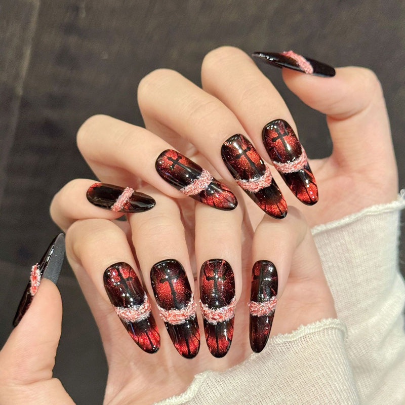 Premium stiletto long nails for dramatic impact - red glitter tips, pink lace border, glossy black, crystal accents, perfect for glamorous events