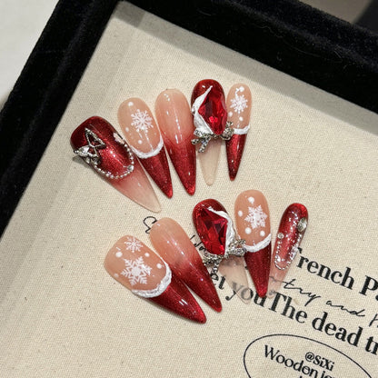 Premium stiletto long press-on nails for holiday elegance - dramatic red glitter, delicate snowflakes, statement ruby, perfect for festive celebrations