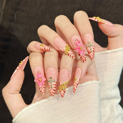Premium stiletto nails for glamorous elegance - 3D pink flower, crystal cross, luxurious gold beads, chic red pattern, perfect for luxury celebrations