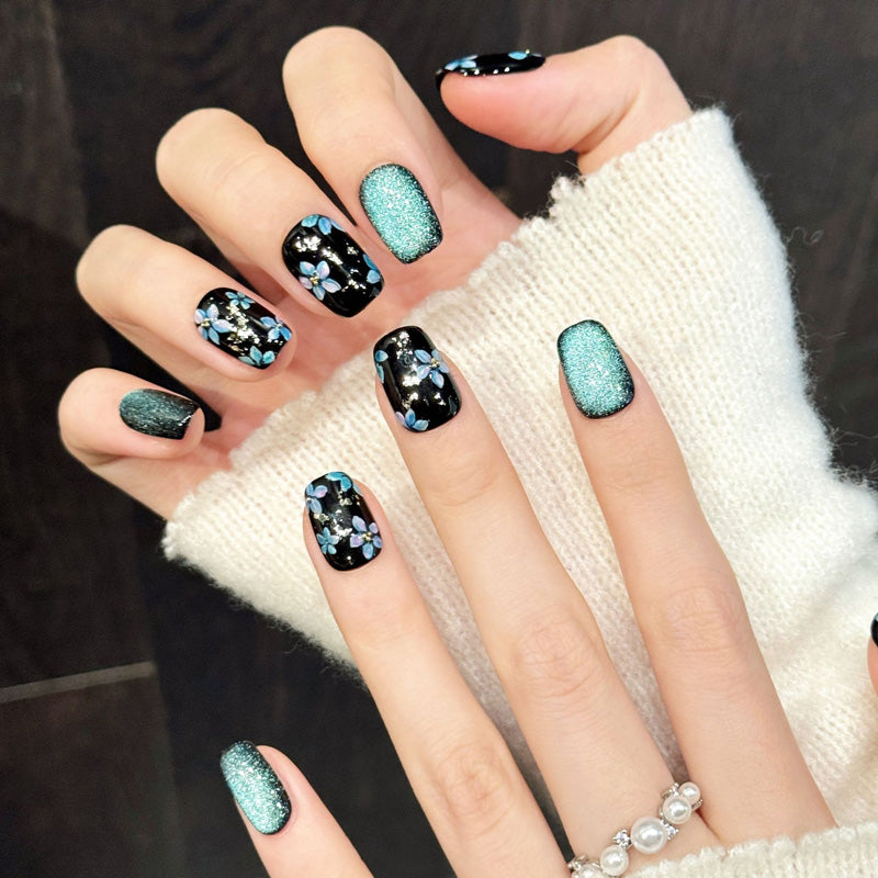 Premium teal floral press-on nails in flattering squoval shape - Handcrafted luxury at home - Includes 10 nails & kit