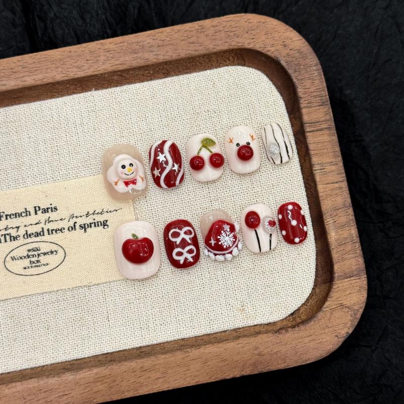 Professional quality Halloween press-on nails with cherry skull theme, squoval short design, complete with application kit and guide