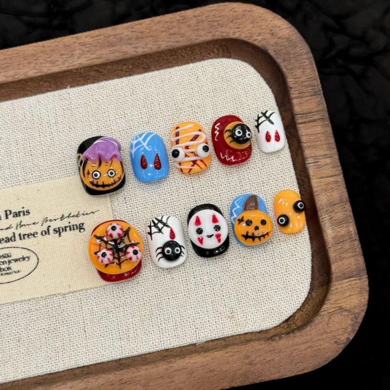 Professional quality Halloween press-on nails with colorful character theme, squoval short design, complete with application kit