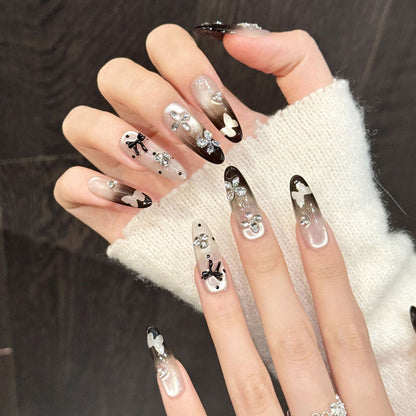 Refined gradient press-on nails with sparkling butterfly embellishments, bow details & dual shape options - handcrafted elegance