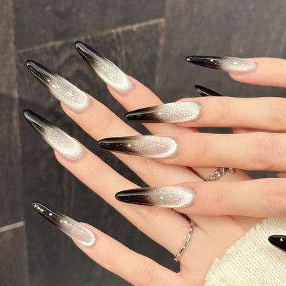 Show-stopping long stiletto nails with luminous champagne, smoky transition & jet black drama - refined edge nail collection