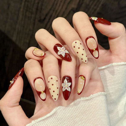 Sophisticated burgundy & nude almond false nails featuring delicate floral art, dimensional gold dots - handcrafted 10-piece set