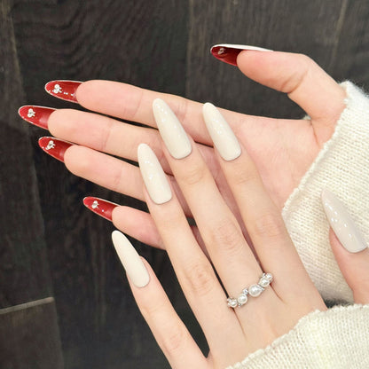 Sophisticated oval press-on nails featuring burgundy red & nude beige - Salon-quality at home - Complete set of 10 nails