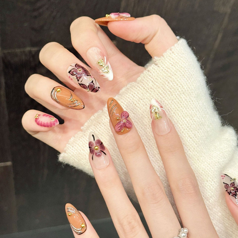 Stunning almond press-on nails featuring floral gradient, rose charm & line art - Salon artistry at home - Complete set of 10