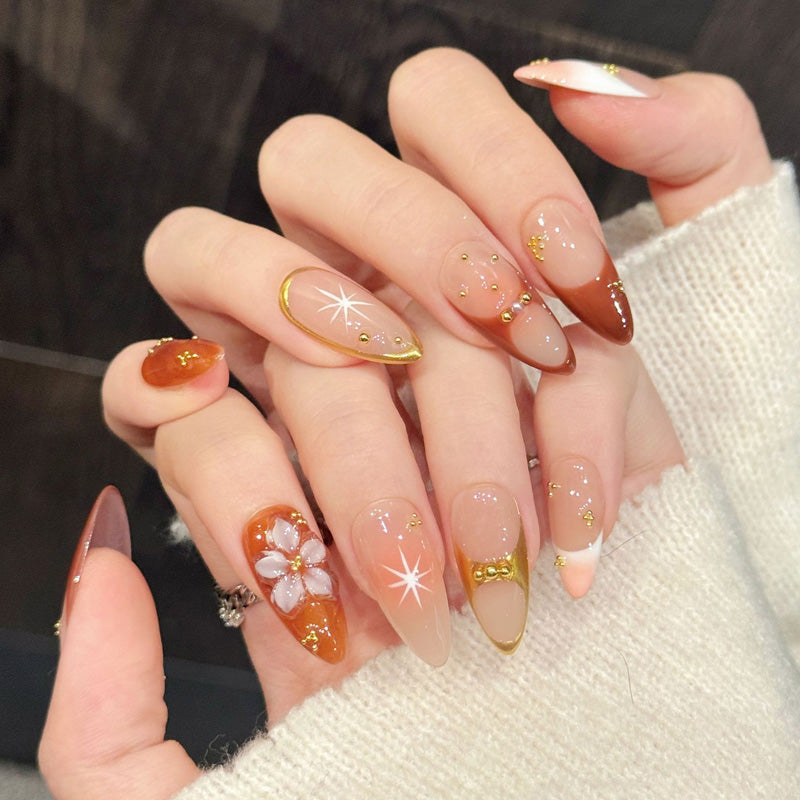 Stunning almond press-on nails featuring sunset ombre, floral art & celestial studs - Salon beauty at home - Set of 10 nails