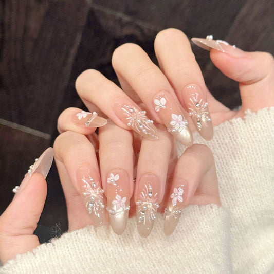 Stunning bridal oval press-on nails featuring metallic gold, pearl flowers & jewelry details - Salon elegance - Complete set of 10