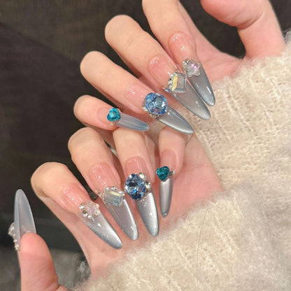 Stunning stiletto long press-on nails with silver chrome, blue gemstones & crystals - perfect for ice queen glamour, winter events & royal style