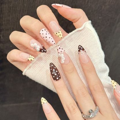 Sweet almond nails with pink-brown polka dots, bow accent, gradient & jelly base - perfect for pink brown polka dot bow gradient sweet charm style