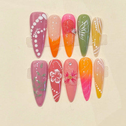 Vibrant extra-long stiletto press-ons with rainbow gradients, hand-painted hibiscus & 3D florals - tropical paradise nail art