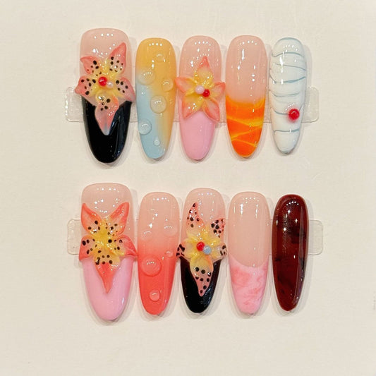 Wearable art collection featuring pressed flowers, watercolor gradients & geometric patterns - handcrafted almond nails for creatives