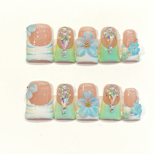 Whimsical handmade duck nails with pastel rainbow gradient, 3D blue flowers & rhinestones - Dreamy elegance - Applies in 15 minutes