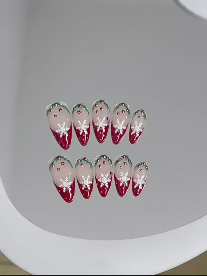 Premium almond press-on nails for Christmas elegance - delicate snowflakes, burgundy ombre, holly accents, perfect for holiday parties